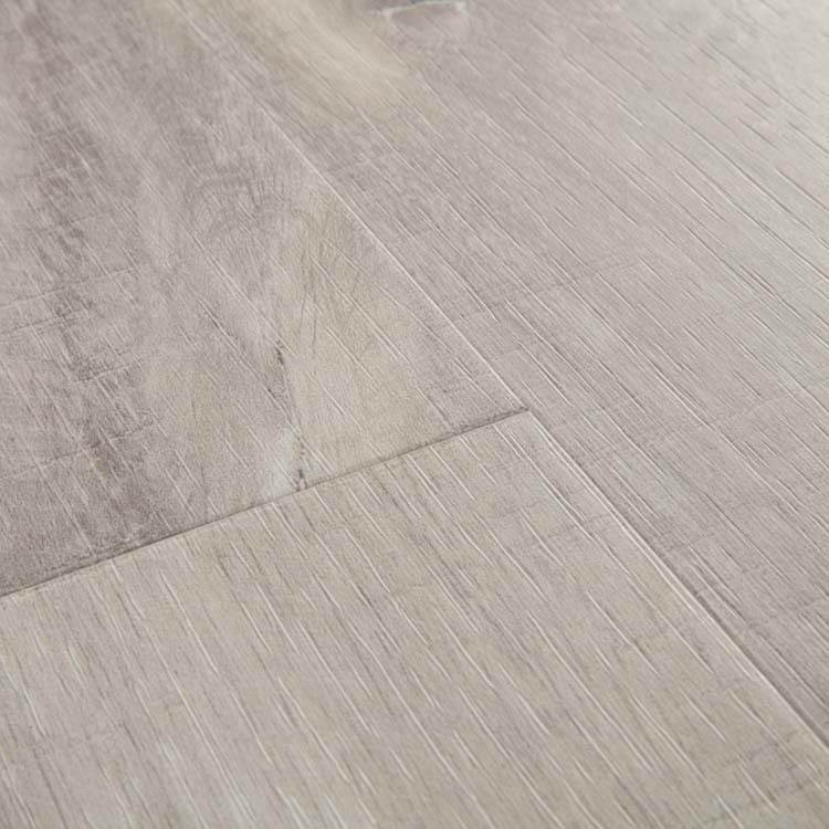 Vinyle Quick-step alpha vinyl small planks 4 plus 1mm chêne canyon gris avec traits de scie