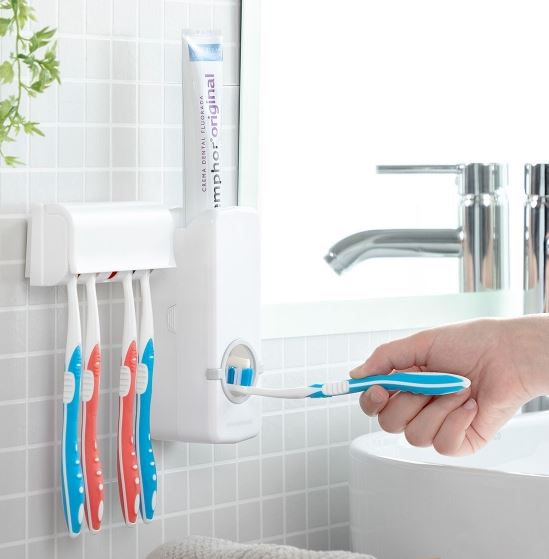 Distributeur de dentifrice avec support pour brosse à dents